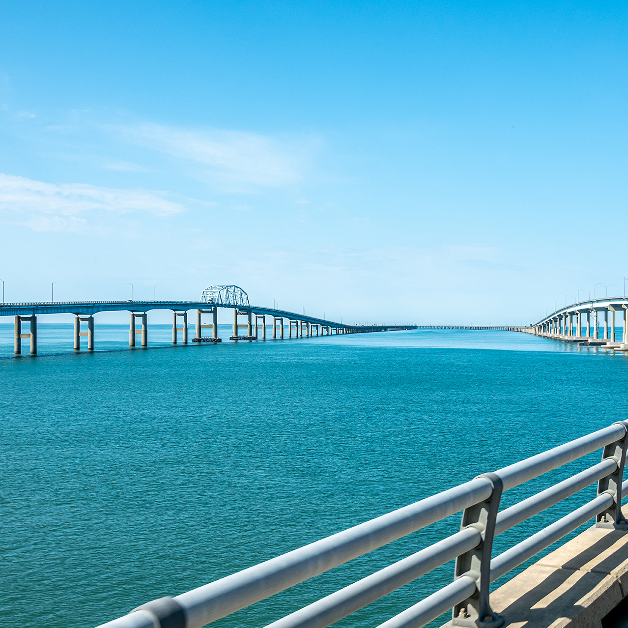 A view of the Chesapeake Bay Bridge and Tunnel, twin bridges crossing the open water